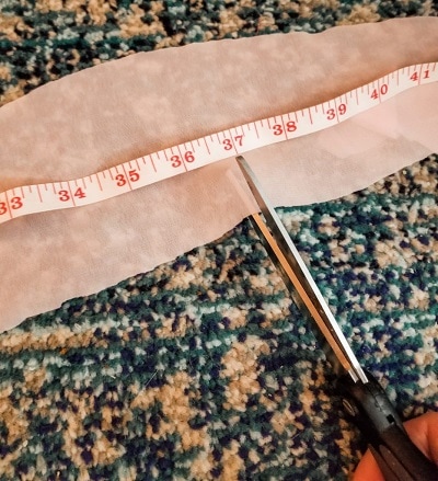 Makeover an old lampshade and make it into a beautiful shabby chic lampshade with a quick and simple DIY no sew fabric project.