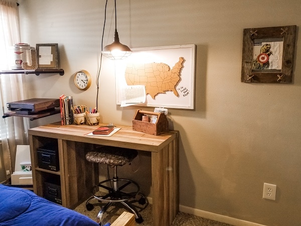 A "shot" of desk organization was created in this hunting themed room with fake ammo boxes made with metal boxes, stencils and paint.