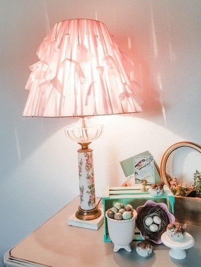 Makeover an old lampshade and make it into a beautiful shabby chic lampshade with a quick and simple DIY no sew fabric project.