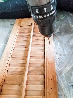 DIY project turning a shutter into a mug rack