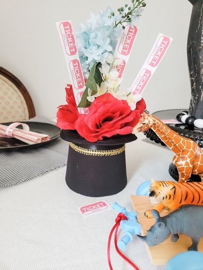 Create a top hat flower arrangement for a circus centerpiece or carnival party decorations
