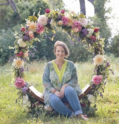 Kristin of the fifth sparrow no more picture in a flower ring