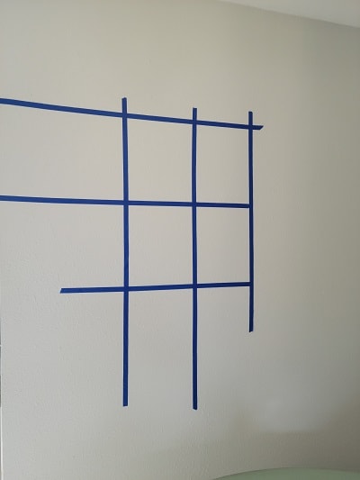 Use Tape To Hang Gallery Wall