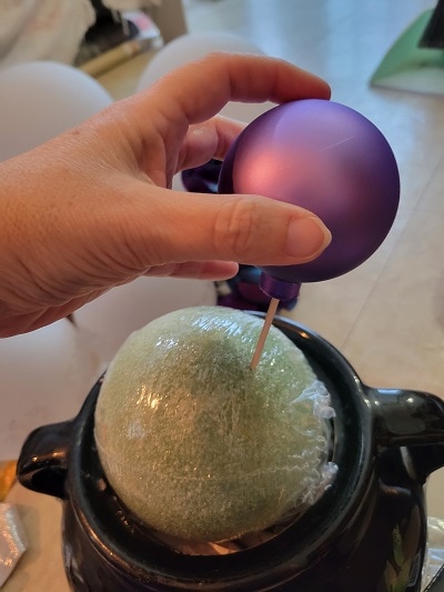 Repurposed ornaments for cauldron bubbles