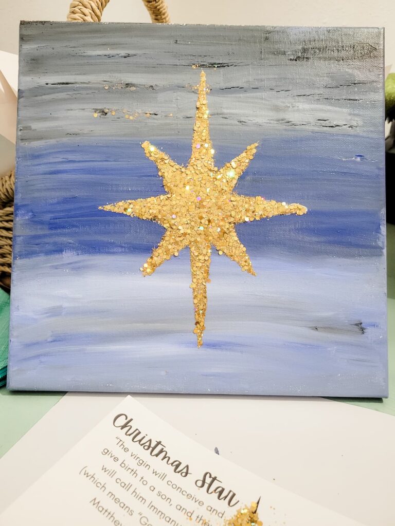 Glittered Christmas star on canvas