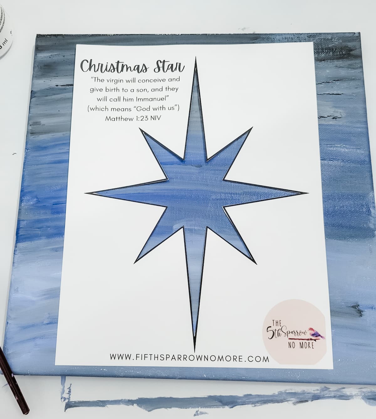 Free printable Christmas star on blue blended canvas