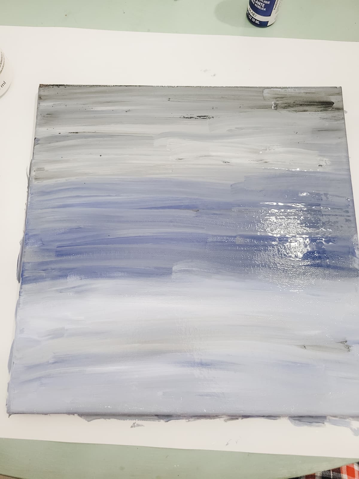 canvas with blue white grey paint blended