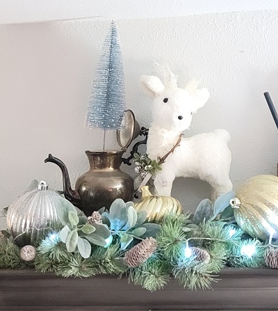 vintage Christmas china cabinet display with an old gas can, and DIY wooden tag