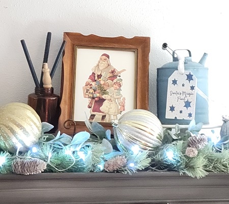 vintage Christmas china cabinet display with an old gas can, and DIY wooden tag