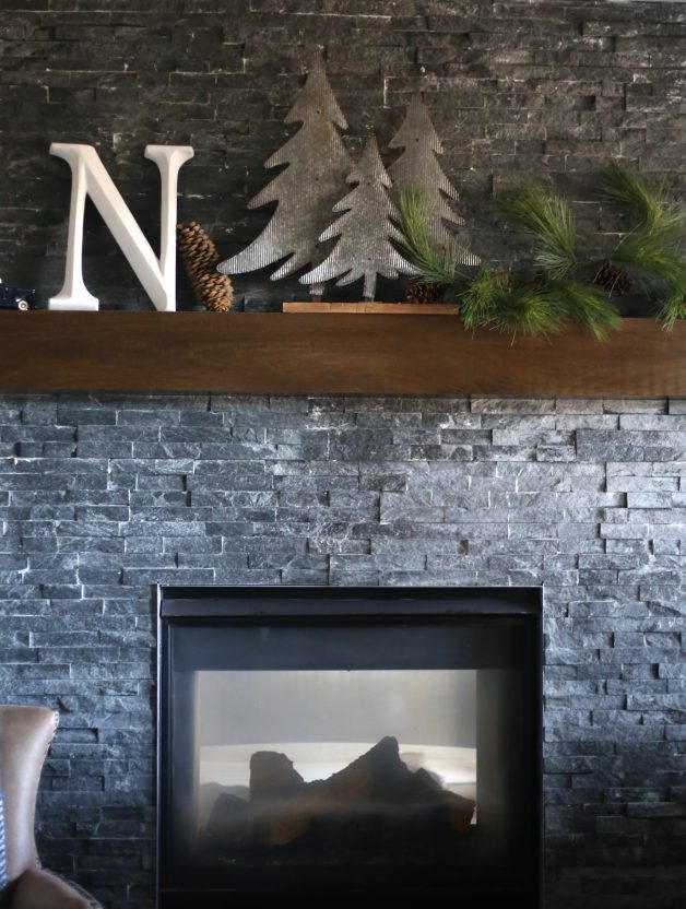 Grey stacked stone fireplace