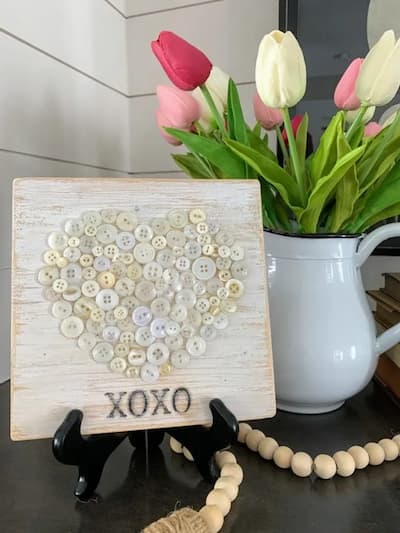 Wooden sign with button heart