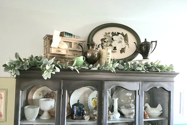 Decorating  Top Of China Cabinet With framed art and vintagepieces