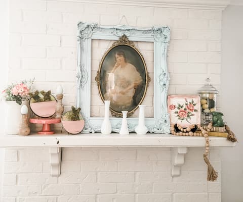 How do easily decorate a beautiful Easter mantel for Spring time? With cheerful pastel colors, bunnies, flower and more.