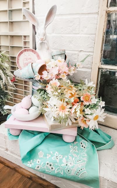 How do easily decorate a beautiful Easter mantel for Spring time? With cheerful pastel colors, bunnies, flower and more.