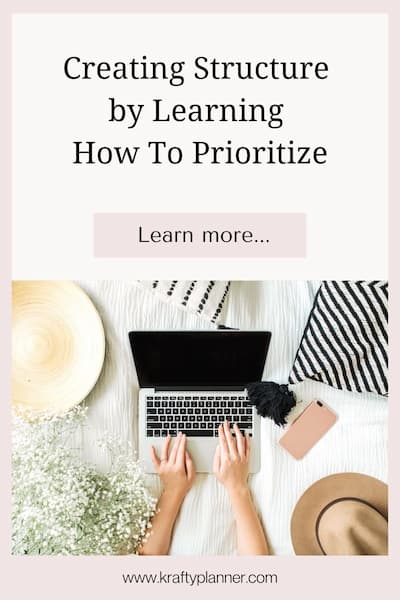 Hand on keyboard with words creating structure by learning how to prioritize