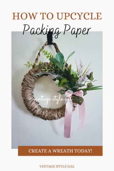 Brown Paper wreath with greenery and pink bow