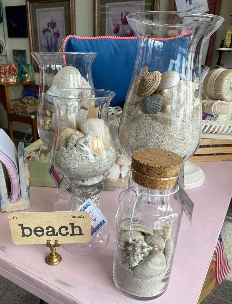 Apothecary jars filled with seashells