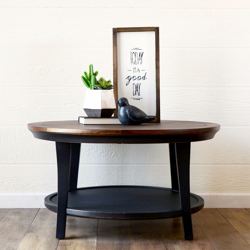 table with woodtone top and black legs