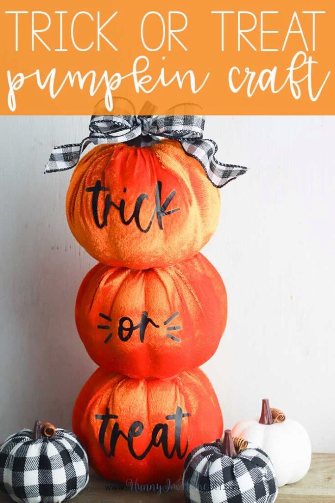 stacked orange pumpkins with words trick or treat on them
