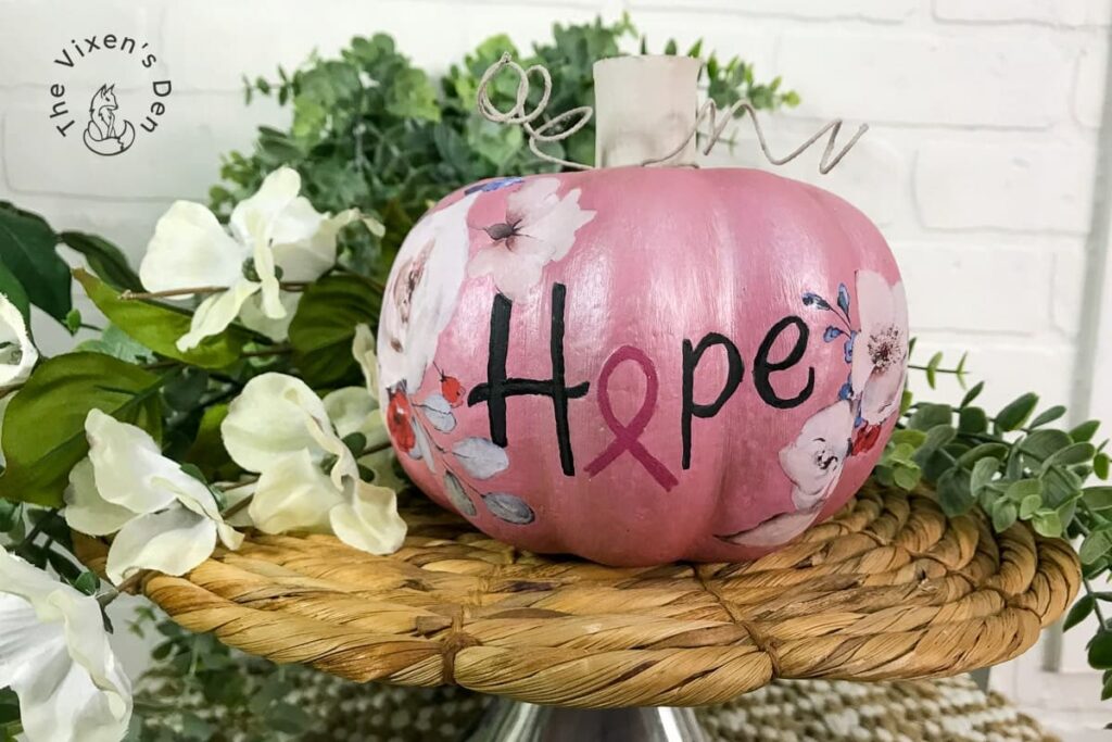 pink pumpkin with breast cancer ribbon