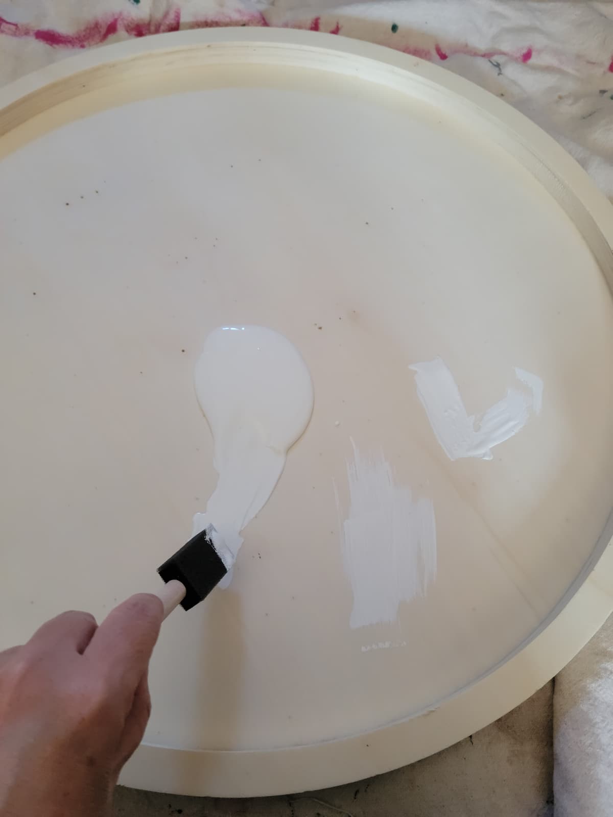 wood round with white paint