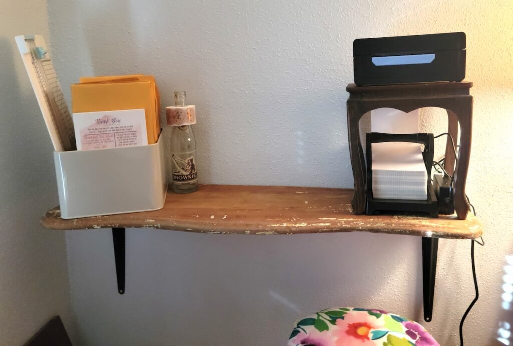 Shelf with box and printer