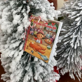 small book in christmas tree