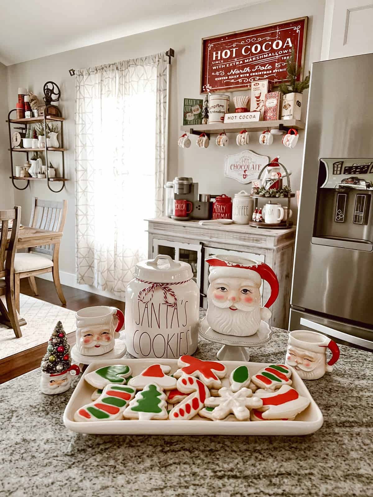 christmas cookies and vintage santas on kitchen counter