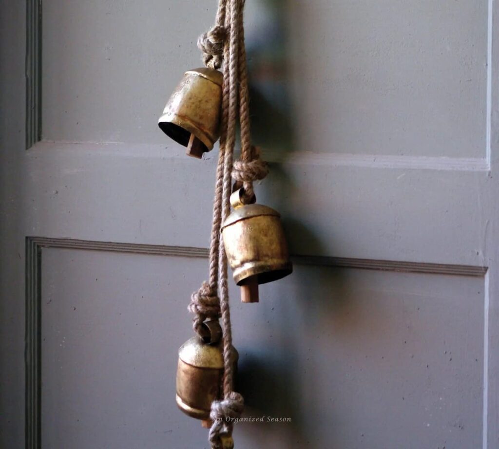 small gold bells on ropes