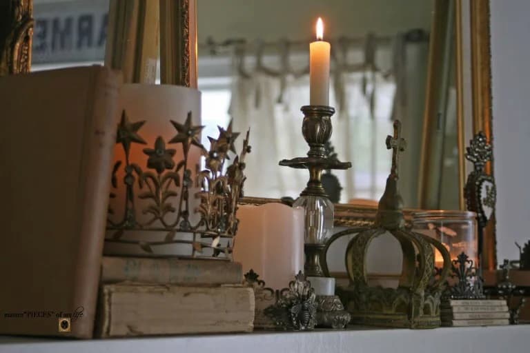 candles in metal candleholders, some look like crowns