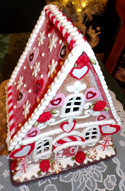 gingerbread house with hearts and flowers