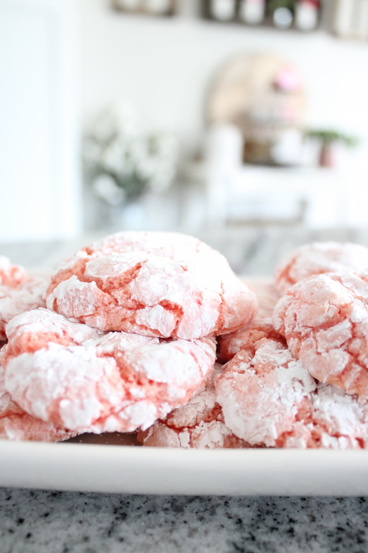 Crackly Pink cookies on a white plate