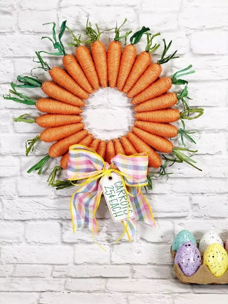 carrot wreath on brick wall