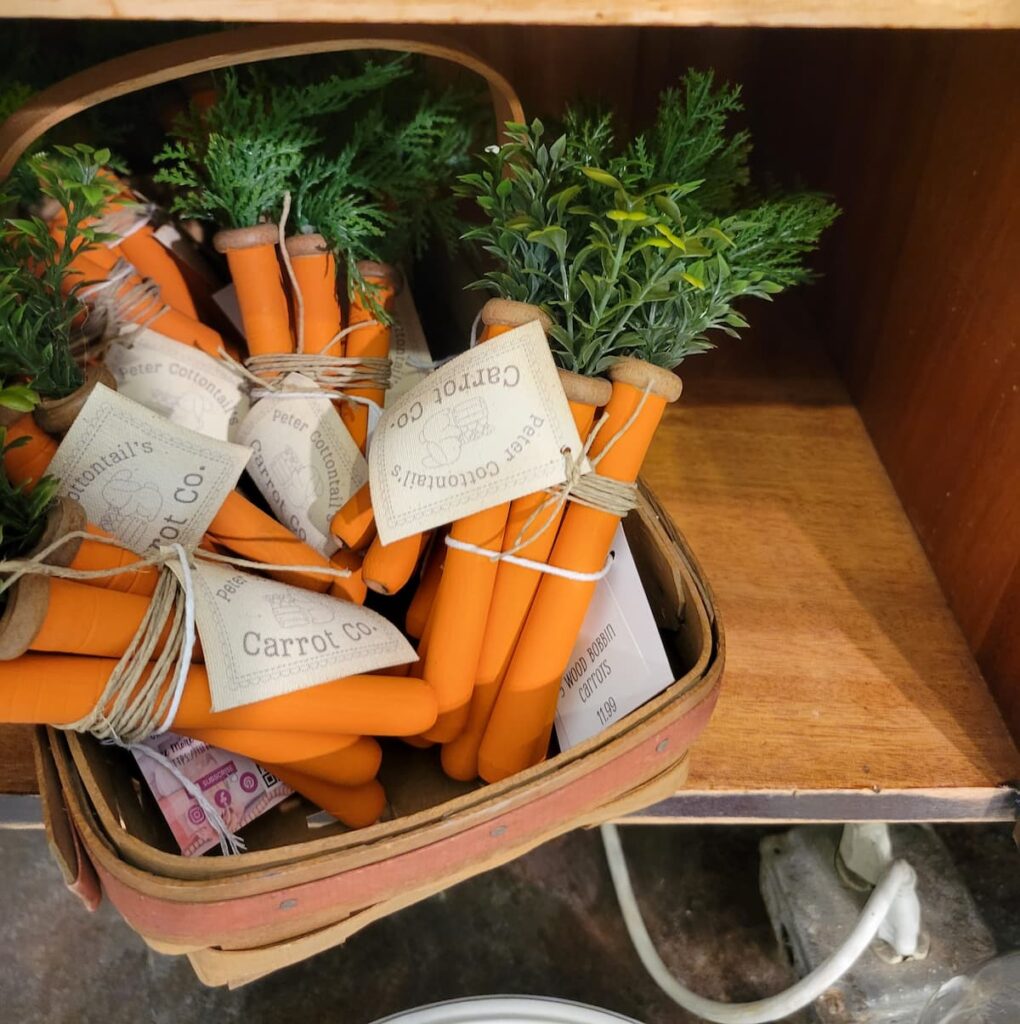 wood carrots in a basket