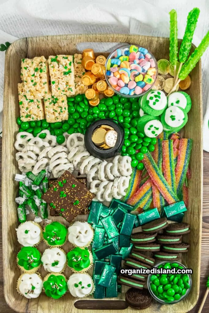 a board with St. Patrick's theme desserts
