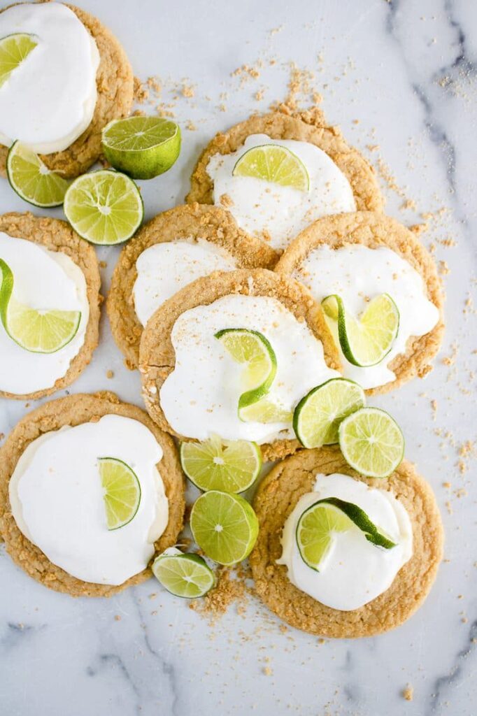 cookies with white icing and limes