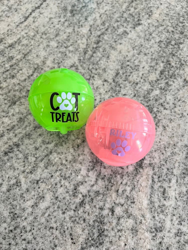 a pink and green cat toy