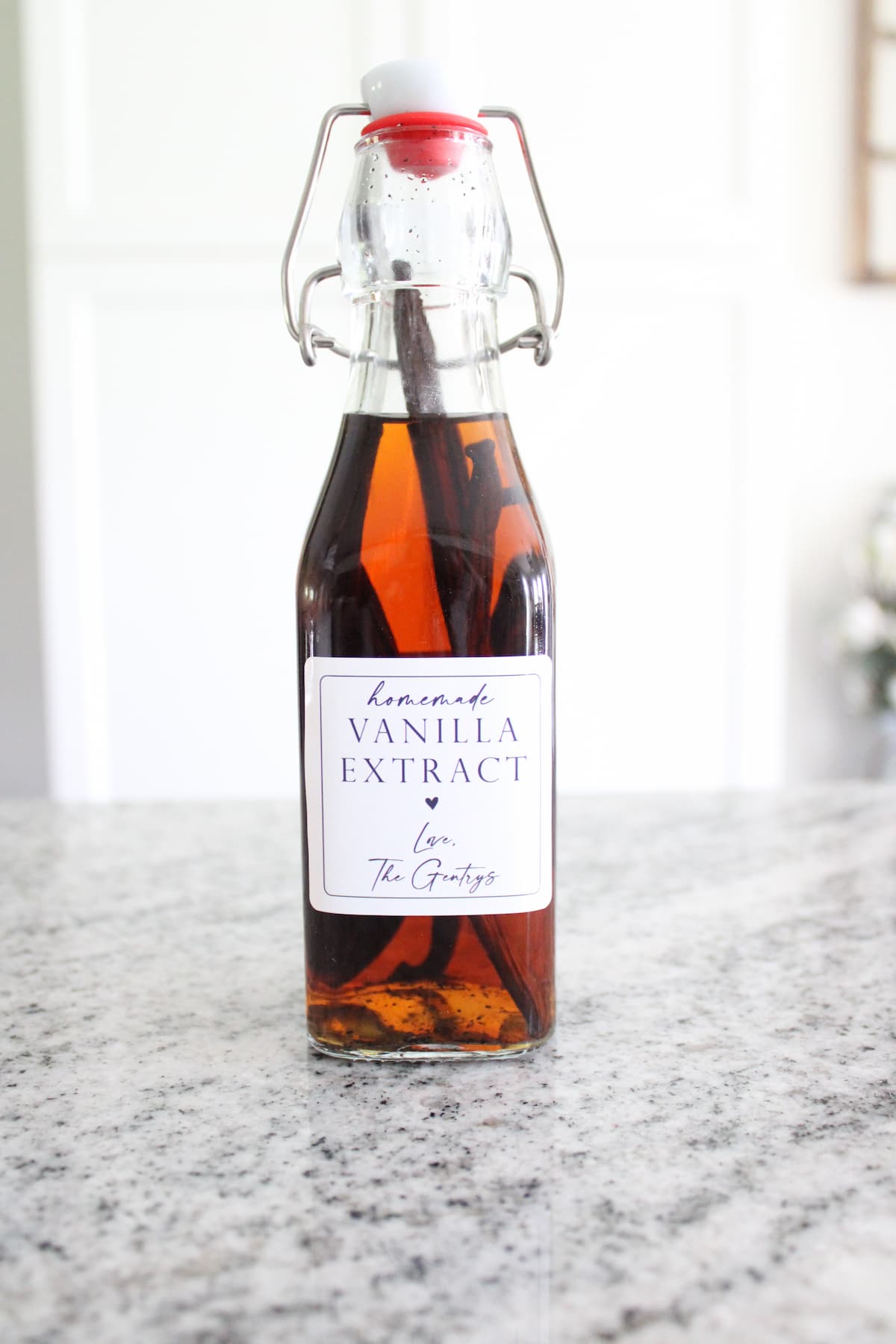 clear glass bottle of vanilla extract