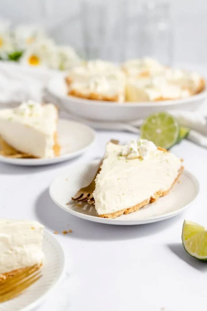 Key lime pie on white plate
