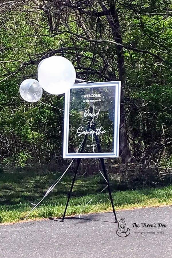 glass in frame sign on easel