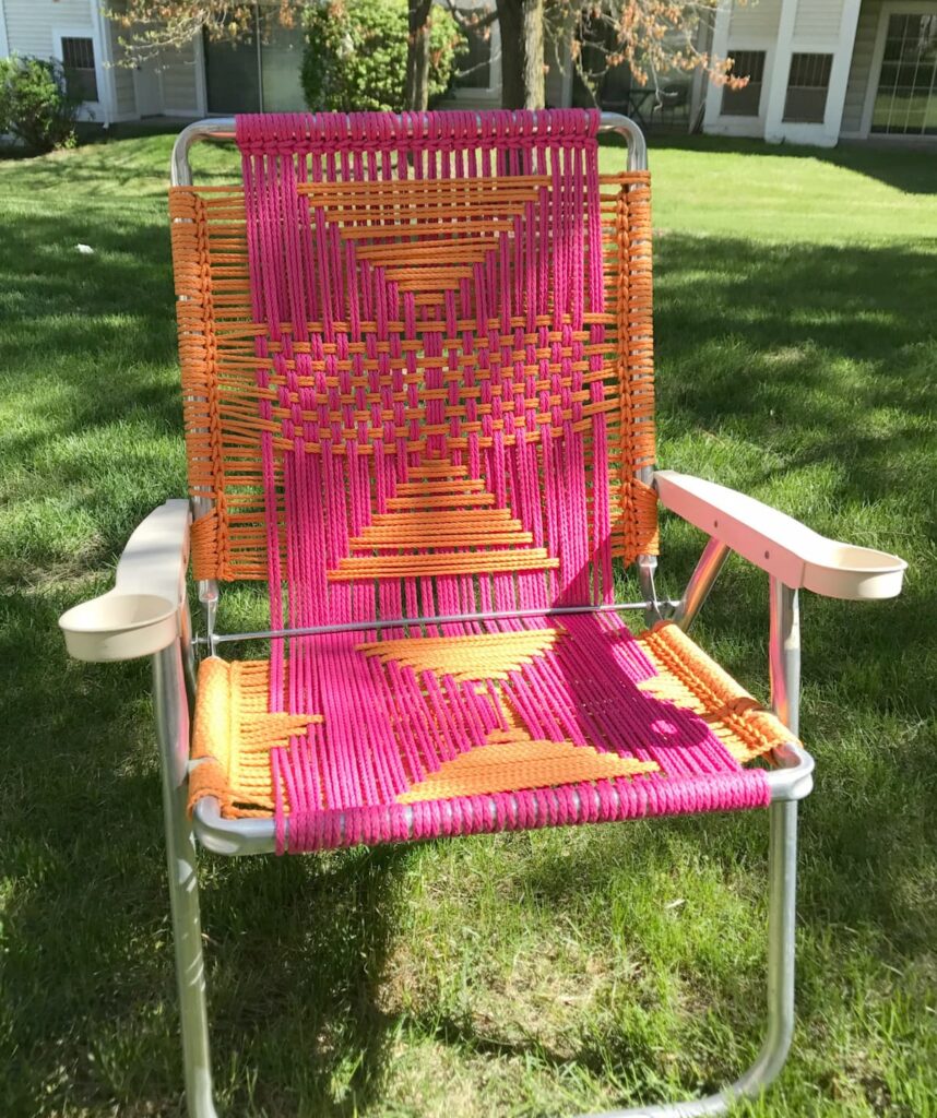 Pink and orange woven lawn chair