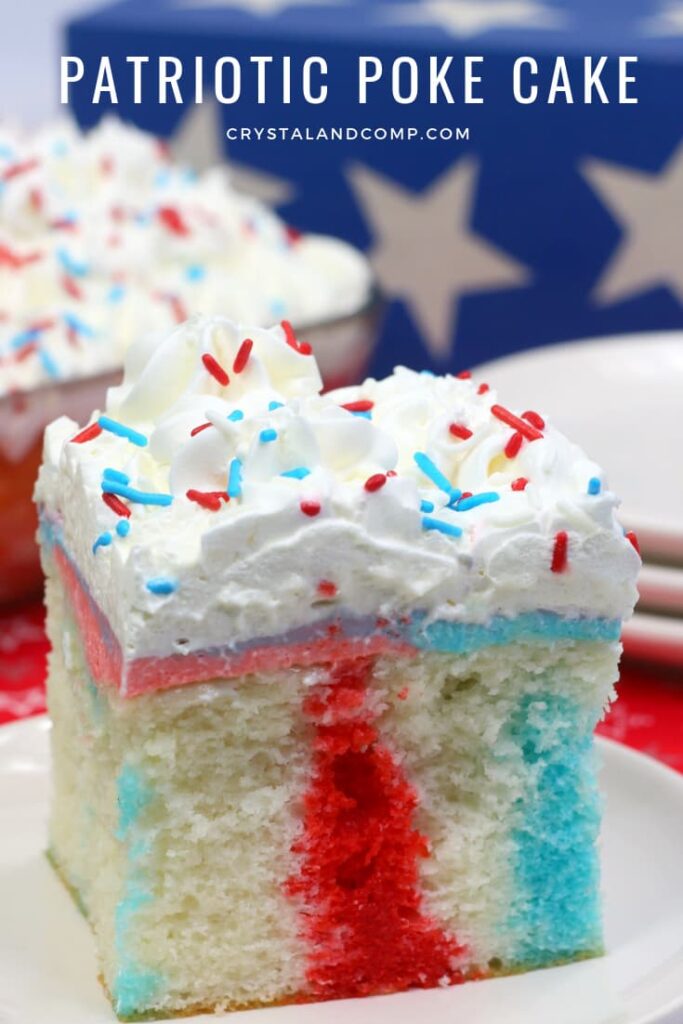 white cake with white frosting and red blue sprinkles