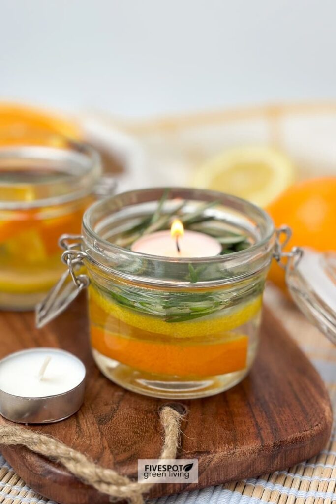 candle in jar with orange