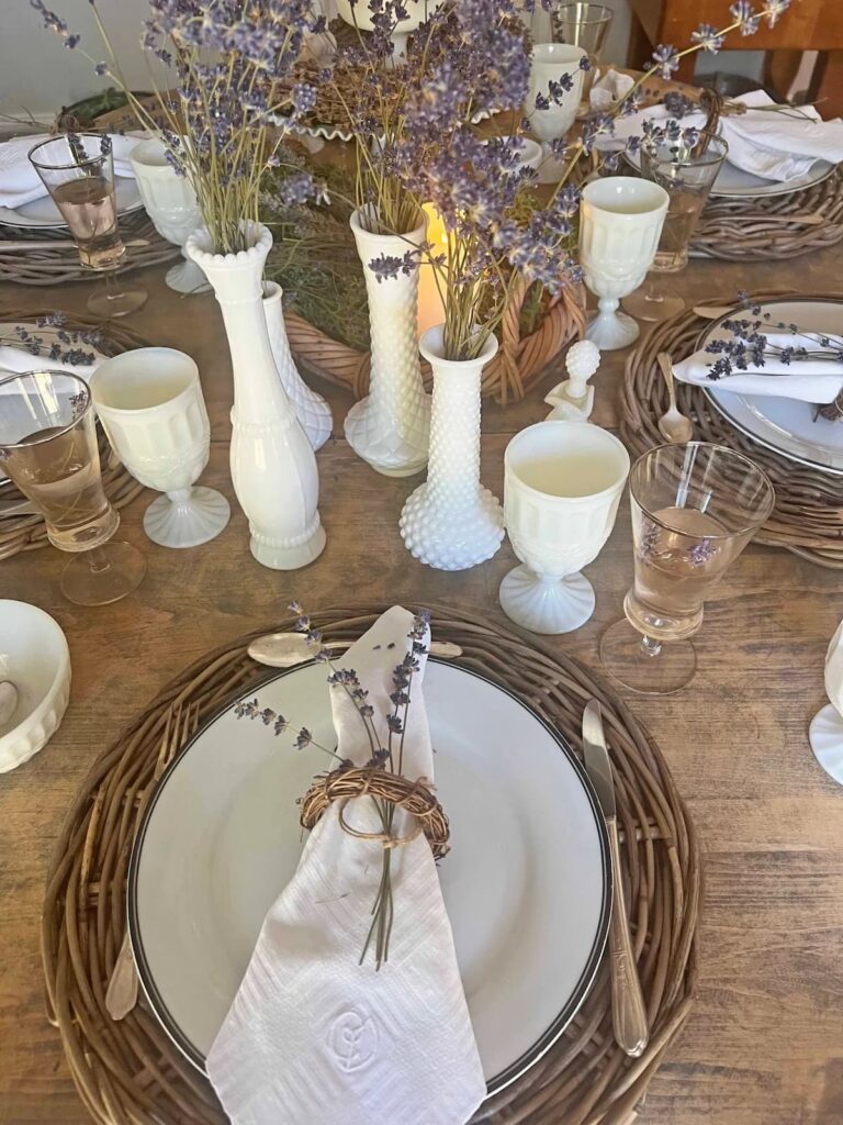 wood table with white vases