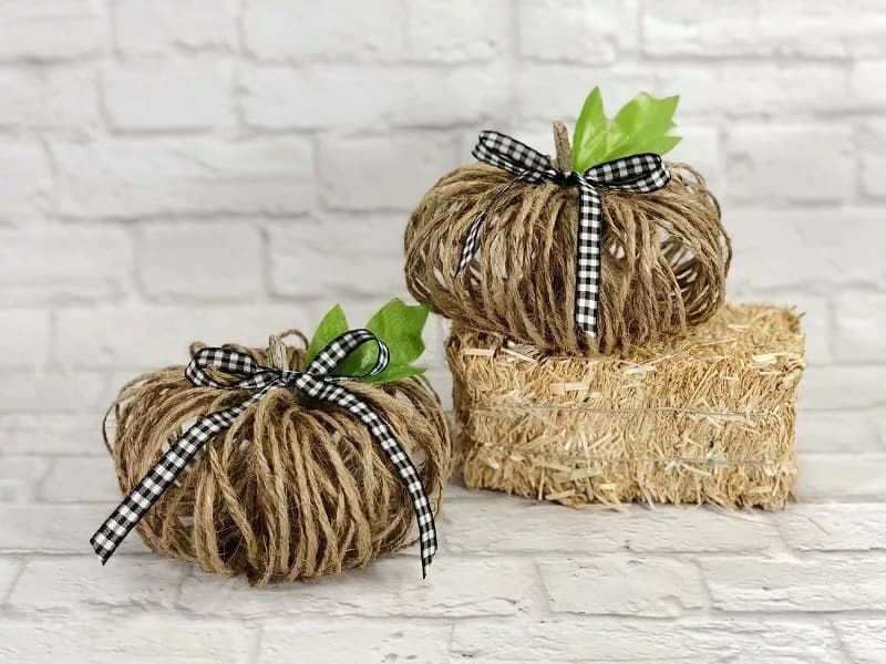 twine pumpkins on hay bale