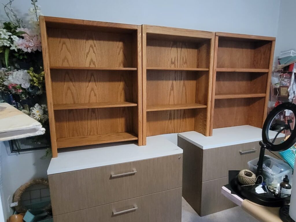 bookcase on top of file cabinets