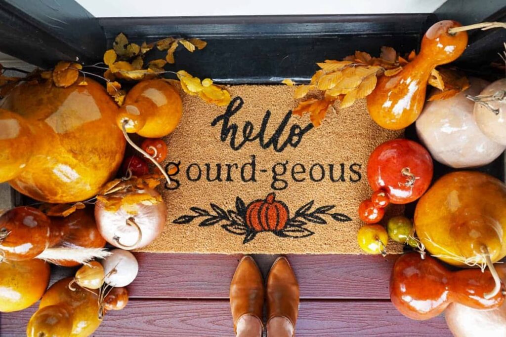 doormat and fall gourds