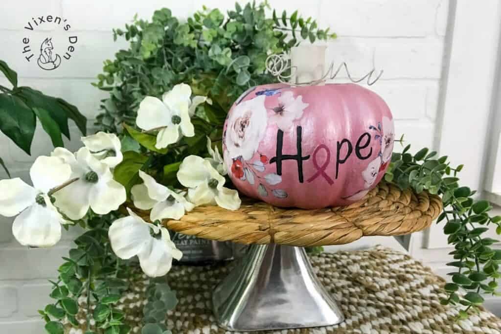 pink pumpkin on cake stand