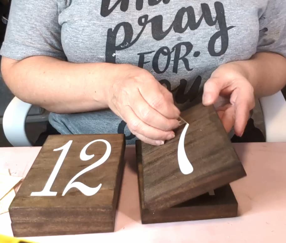 peeling number off of wood blocks