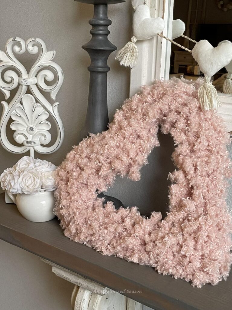 pink fuzzy heart on shelf